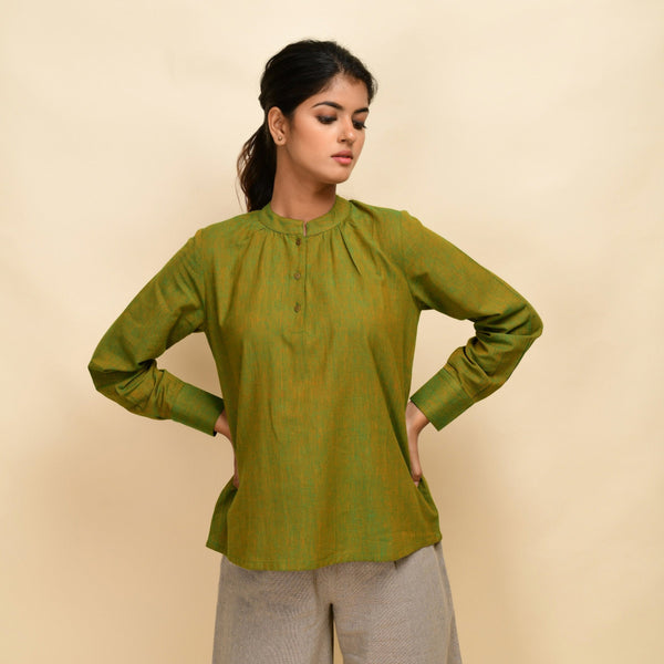 Front View of a Model wearing Olive Gold 100% Cotton Yoked Top