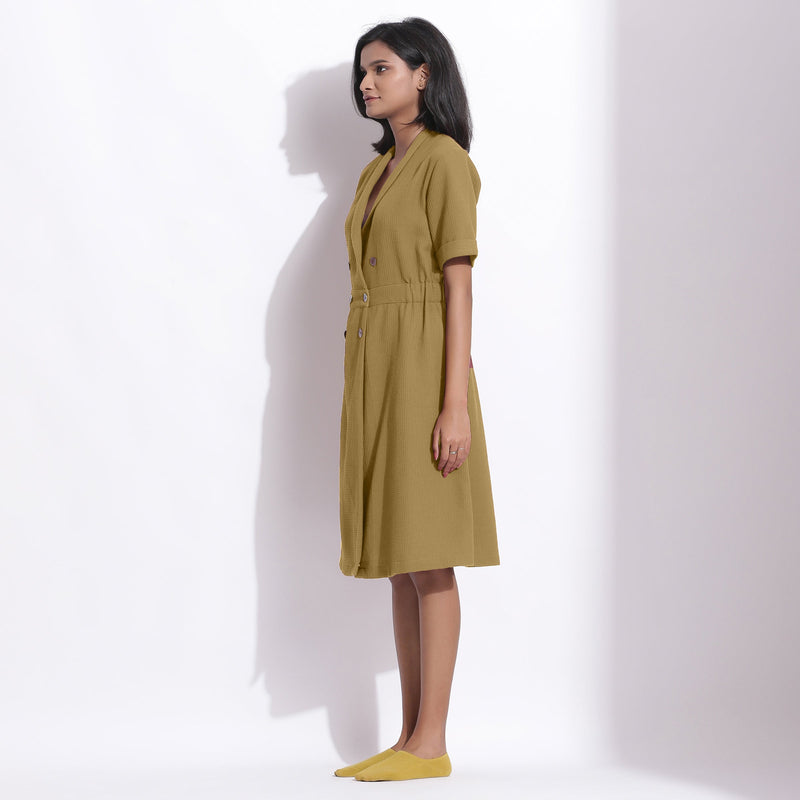 Back View of a Model wearing Olive Green Cotton Waffle Knee Length Coat Dress