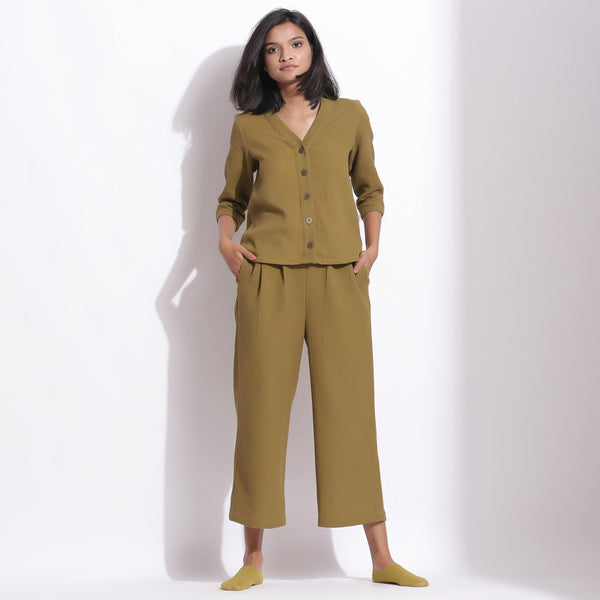 Front View of a Model wearing Olive Green Button-Down Top and Culottes Set