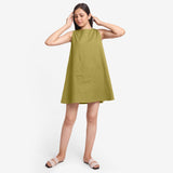 Front View of a Model wearing Olive Green Cotton Flax Kangaroo Pocket Dress