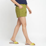 Right View of a Model wearing Olive Green Cotton Flax Short Shorts