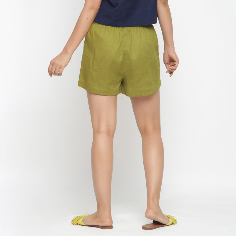 Back View of a Model wearing Olive Green Cotton Flax Short Shorts