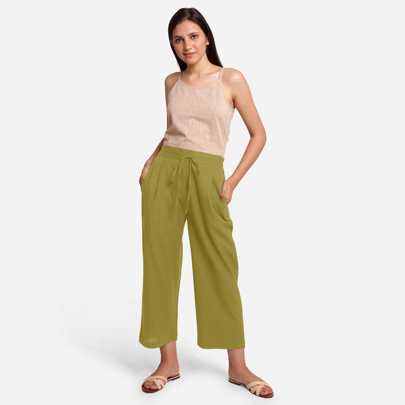 Front View of a Model wearing Olive Green Cotton Flax Wide Legged Pant