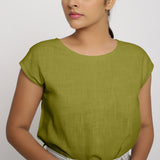 Front Detail of a Model wearing Olive Green Cotton Slub Straight Top