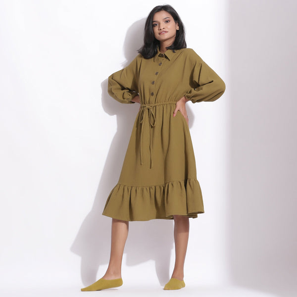 Left View of a Model wearing Olive Green Warm Cotton Waffle Knee Length Dress