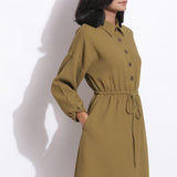 Right Detail of a Model wearing Olive Green Warm Cotton Waffle Knee Length Dress