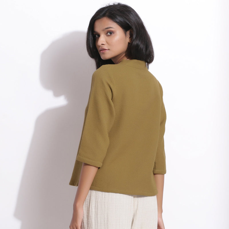 Back View of a Model wearing Olive Green Warm Cotton Waffle Button-Down Top