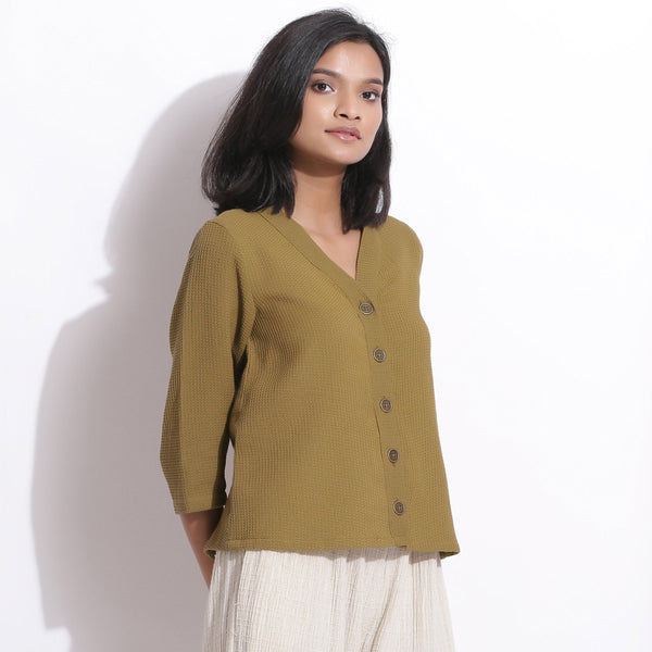 Right View of a Model wearing Olive Green Warm Cotton Waffle Button-Down Top