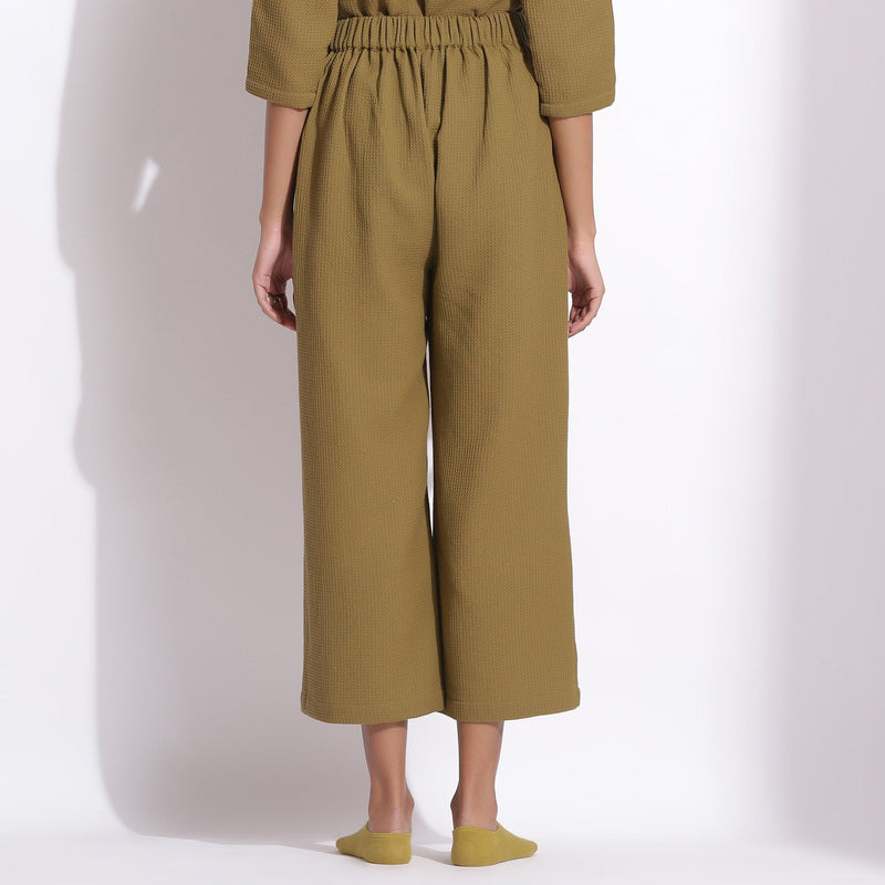 Back View of a Model wearing Olive Green Warm Cotton Waffle Relaxed Culottes