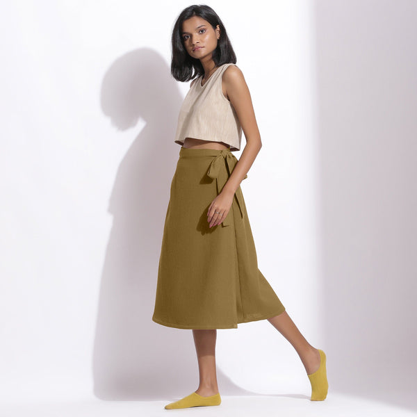 Left View of a Model wearing Olive Green Cotton Waffle Wrap Skirt