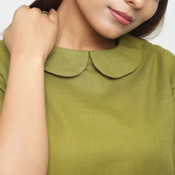Front Detail of a Model wearing Olive Green Everyday Essential A-Line Top