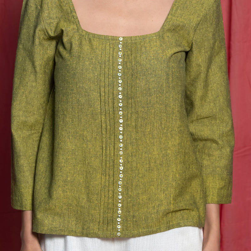 Front Detail of a Model wearing Olive Green Square Neck Handspun Cotton Hand Beaded Top