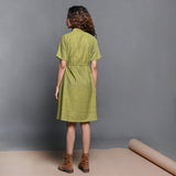 Back View of a Model wearing Olive Green Handspun Cotton Short Safari Dress