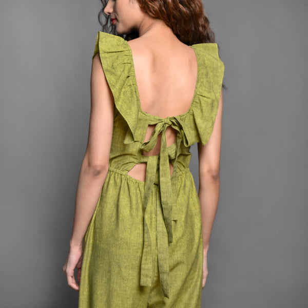 Back Detail of a Model wearing Olive Green Handspun Cotton Frilled Jumpsuit