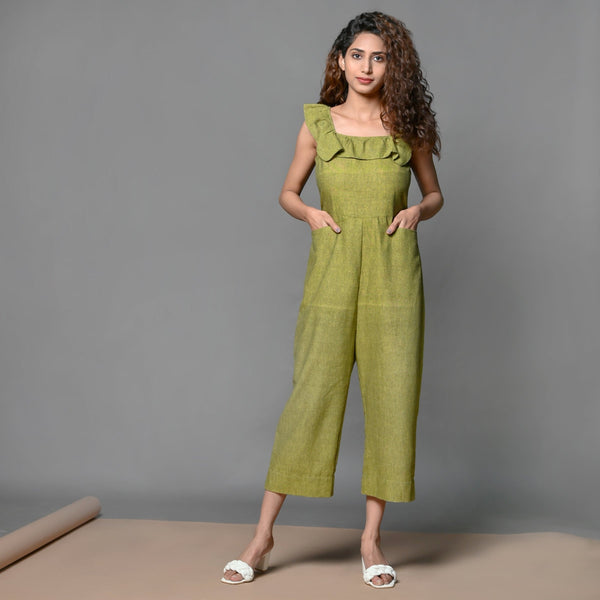 Front View of a Model wearing Olive Green Handspun Cotton Frilled Jumpsuit