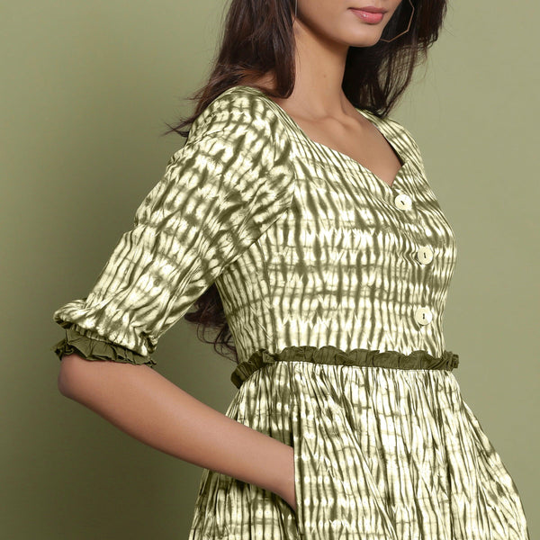 Front Detail of a Model wearing Olive Green Shibori Asymmetrical Tier Maxi Dress