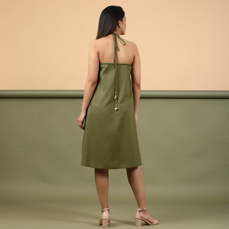Back View of a Model wearing Olive Green Shibori Halter Neck A line Dress