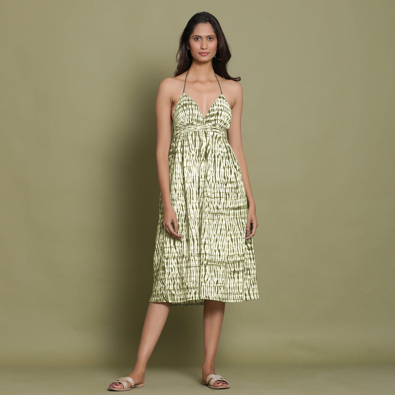 Front View of a Model wearing Olive Green Shibori Halter Neck Gathered Dress
