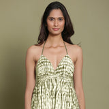Front Detail of a Model wearing Olive Green Shibori Halter Neck Gathered Dress