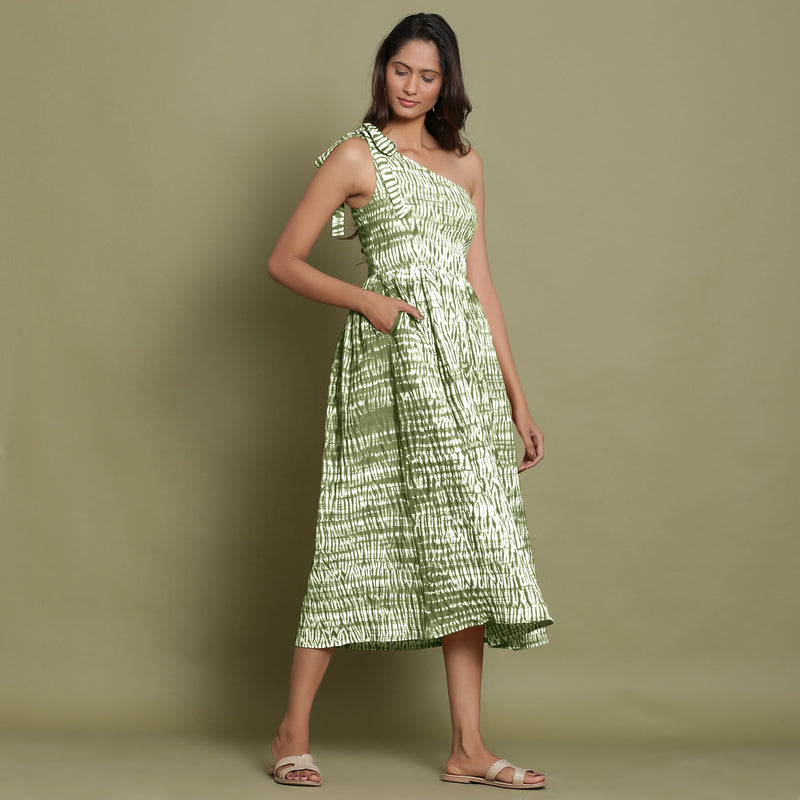Right View of a Model wearing Olive Green Shibori One-Shoulder Midi Dress