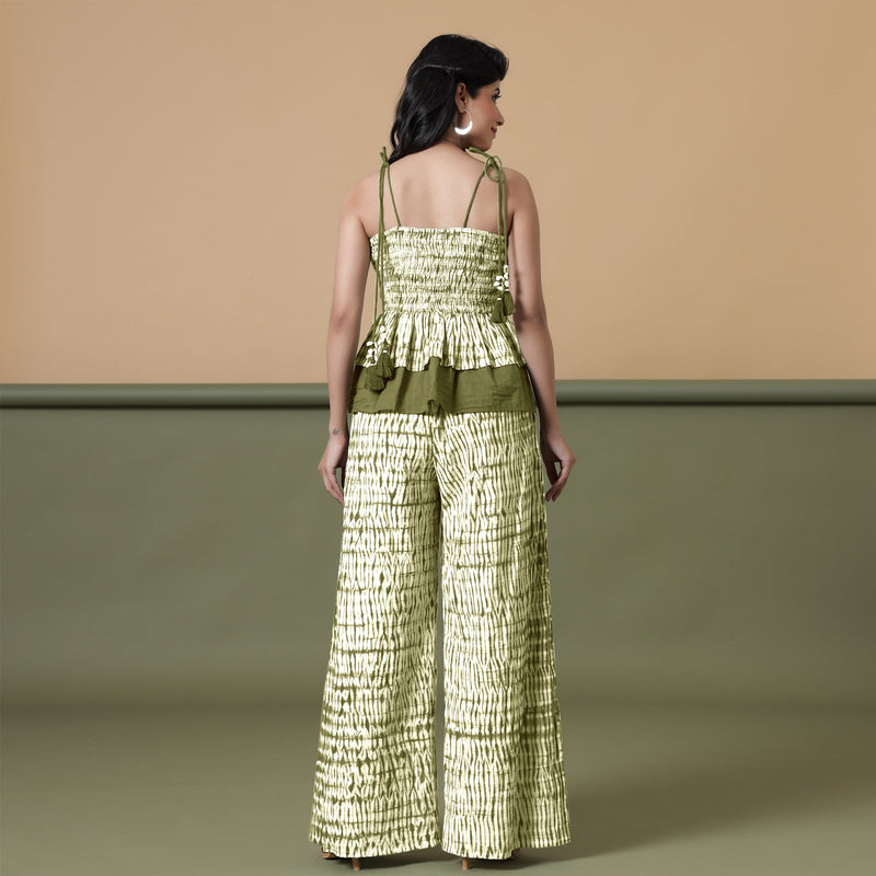 Back View of a Model wearing Olive Green Shibori Paperbag Cotton Pant