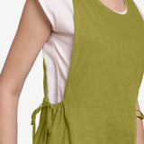 Right Detail of a Model wearing Olive Green Waist Tie Up Pinafore Jumpsuit