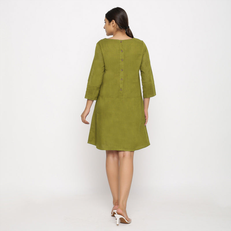 Back View of a Model wearing Olive Green Yoked Cotton Tunic Dress