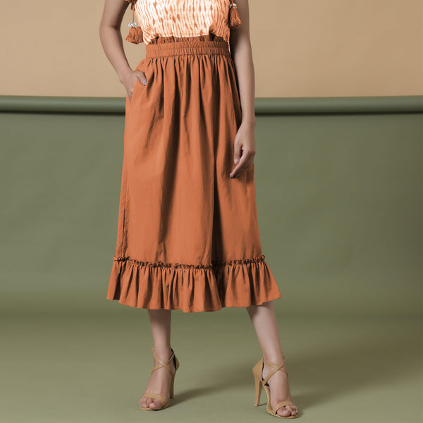 Front View of a Model wearing Orange A-Line Ruffled Cotton Skirt