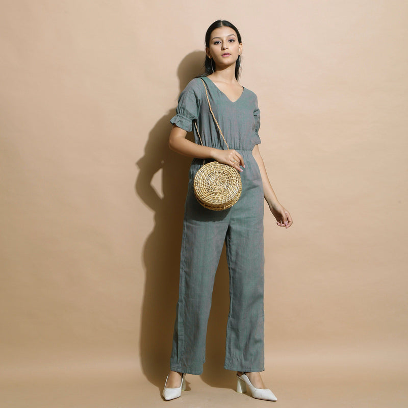 Front View of a Model wearing Dark Green Handspun Cotton Frilled Sleeve Jumpsuit