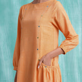 Front Detail of a Model wearing Orange Comfort Fit Mirror Work Dress