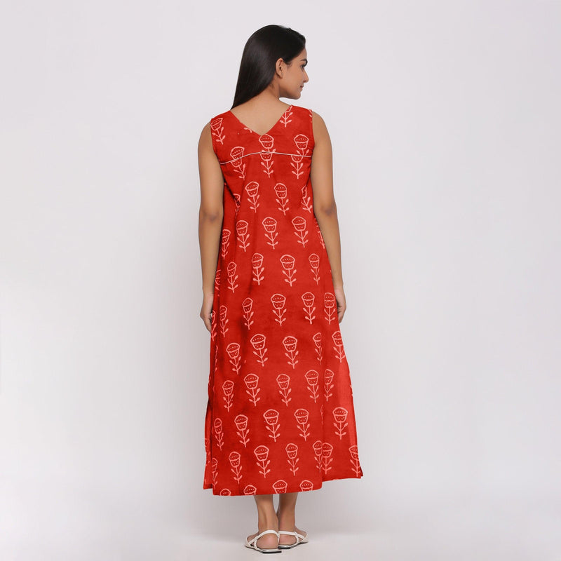 Back View of a Model Wearing Orange Dabu Block Print 100% Cotton Maxi Dress