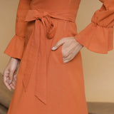 Front Detail of a Model wearing Orange Cotton Crew Neck Floor Length Tier Dress