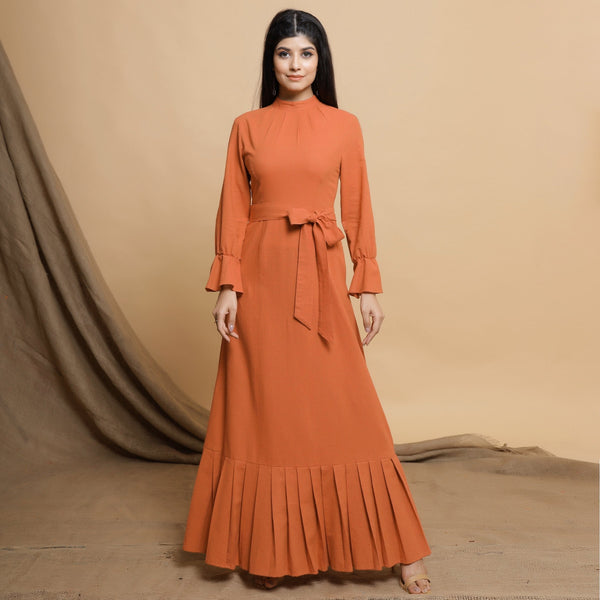 Front View of a Model wearing Orange Floor Length Pleated Tier Dress