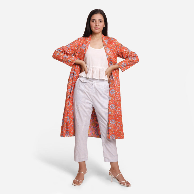 Front View of a Model wearing Orange Floral Block Printed Cotton Trench Coat