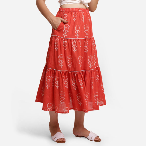 Right View of a Model wearing Orange Floral Block Print Cotton Maxi Skirt