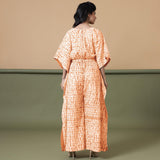 Back View of a Model wearing Orange Shibori V-Neck Kaftan Jumpsuit
