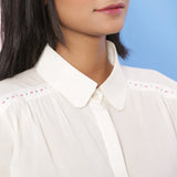 Front Detail of a Model wearing Organic Cotton Beaded Lace White Shirt