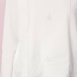 Front Detail of a Model wearing Organic Cotton Embroidered Split Neck Top
