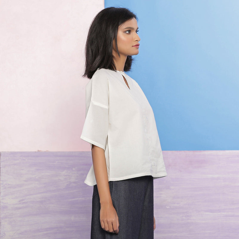 Right View of a Model wearing Organic Cotton Hand Embroidered Paneled Top