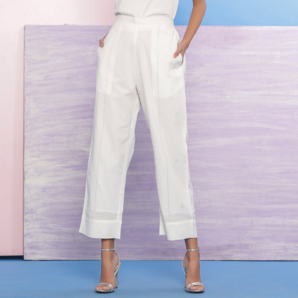 Front View of a Model wearing Organic Cotton White Embroidered Straight Pant