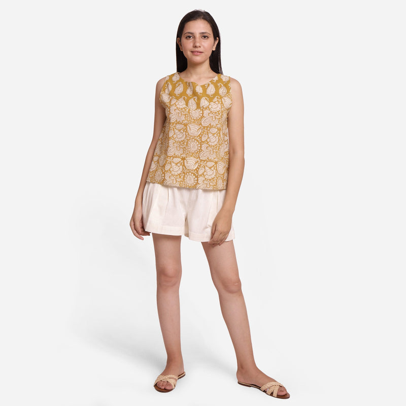 Front View of a Model wearing Mustard Paisley Block Print Sleeveless Cotton Top