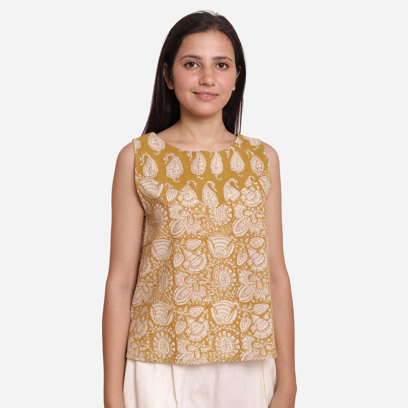 Front View of a Model wearing Mustard Paisley Block Print Sleeveless Cotton Top
