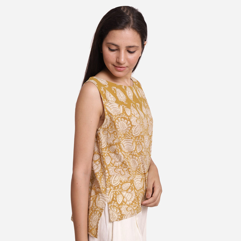 Right View of a Model wearing Mustard Paisley Block Print Sleeveless Cotton Top