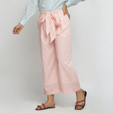 Left View of a Model wearing Peach Mid Rise Cotton Straight Pant