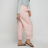 Right View of a Model wearing Peach Mid Rise Cotton Straight Pant