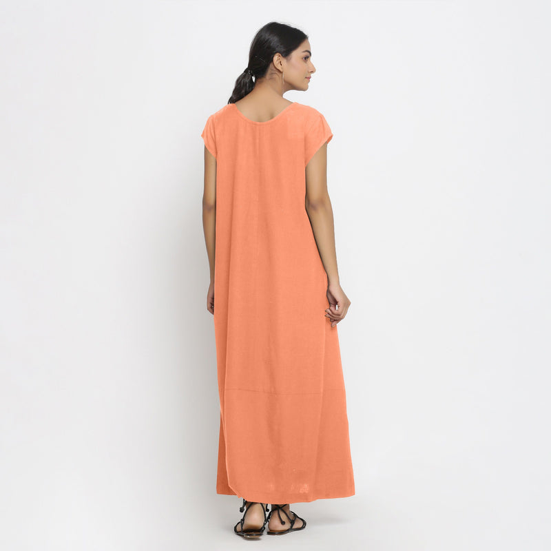 Back View of a Model wearing Peach Cotton Flax A-Line Paneled Dress