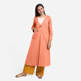 Front View of a Model wearing Peach Cotton Flax Mid-Calf Length A-Line Jacket