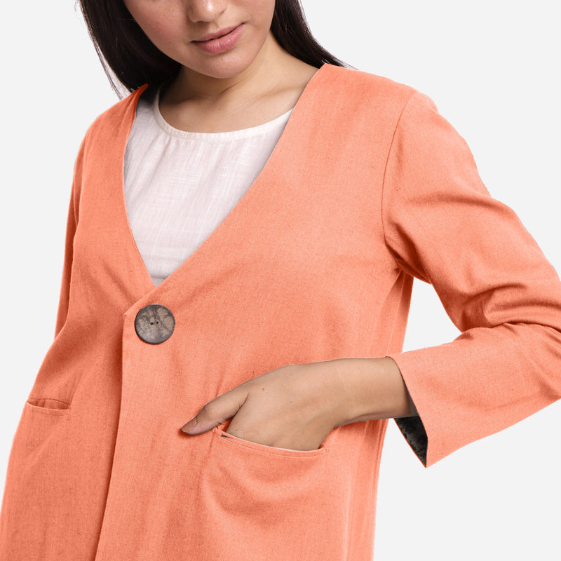Front Detail of a Model wearing Peach Cotton Flax Mid-Calf Length A-Line Jacket