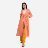 Front View of a Model wearing Peach Cotton Flax Mid-Calf Length A-Line Jacket