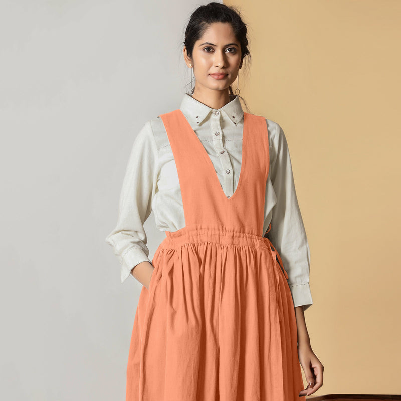 Front View of a Model wearing Peach Cotton Flax Pinafore Midi Wrap Dress